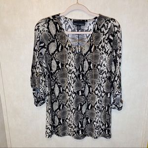 Isabella Rodriguez snake skin print shirt. size L.